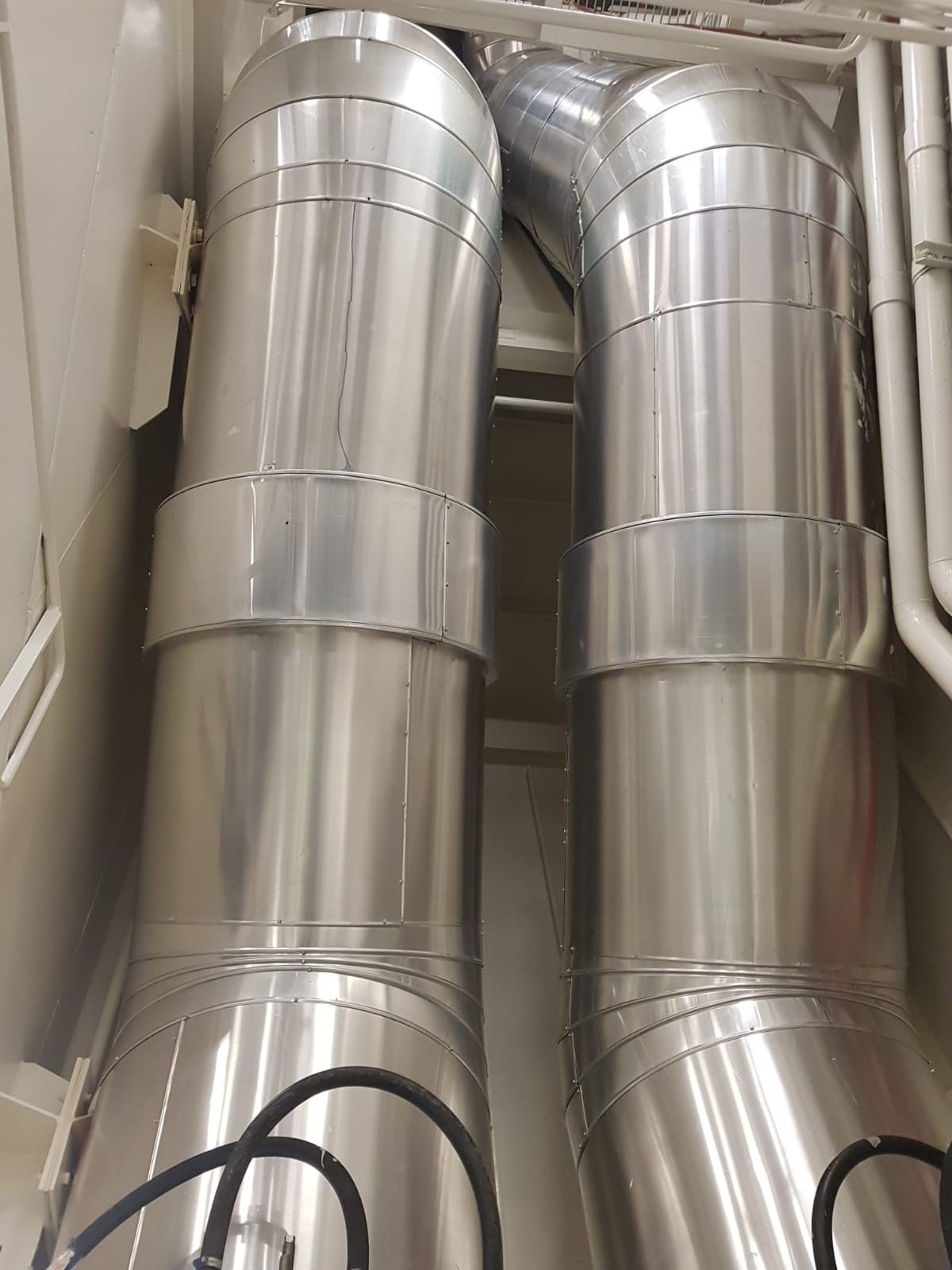 Insulated GRE piping risers, dual duct installation